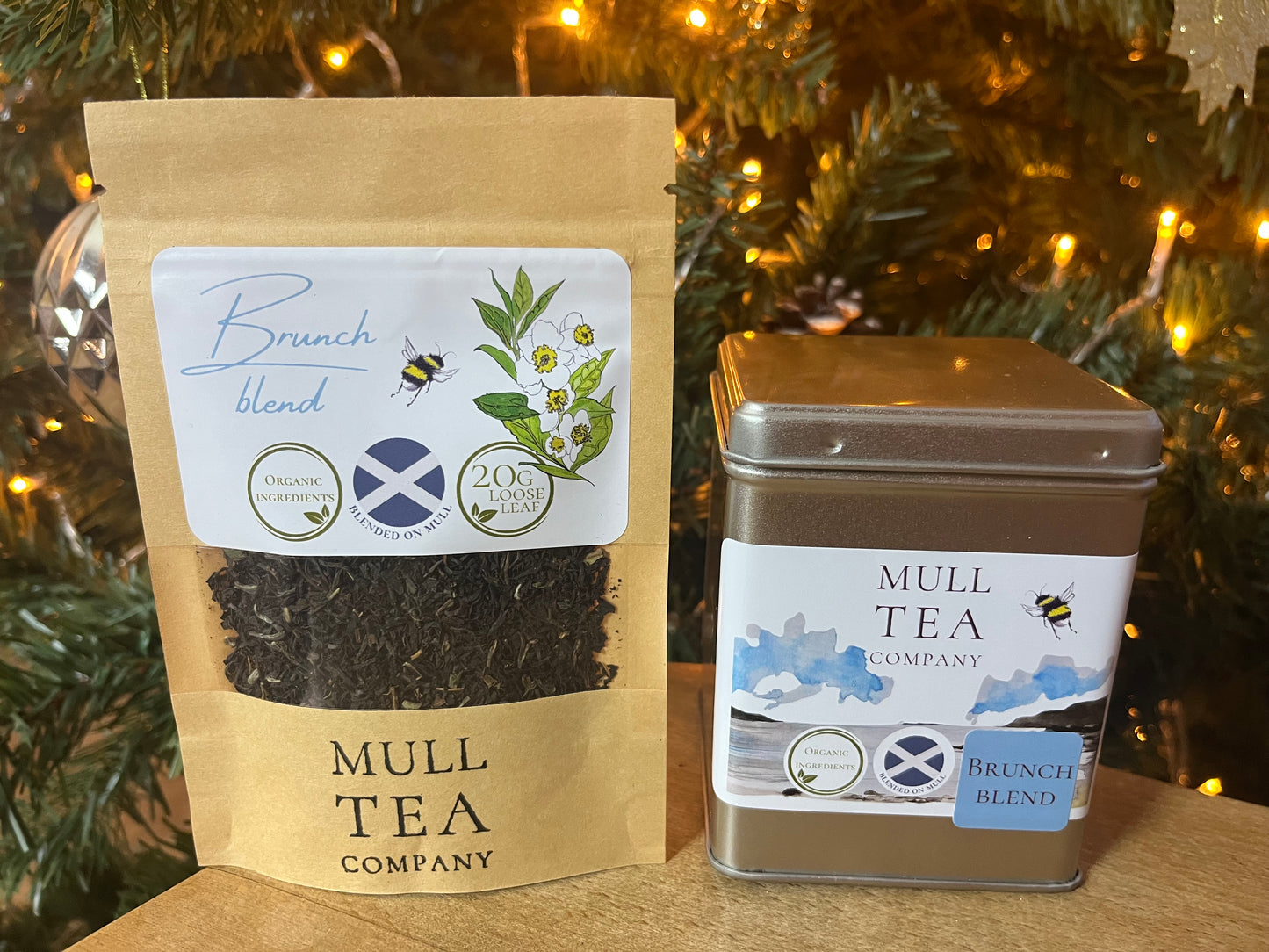 Mull Tea Company tea packaging with a Christmas tree in the background
