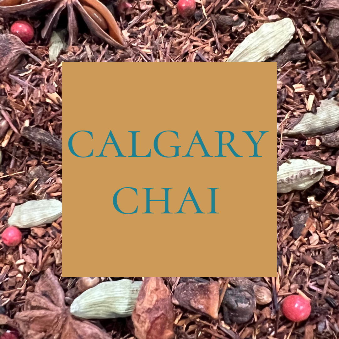 Tea leaves with spices and a square label reading 'Calgary Chai' on a textured background.